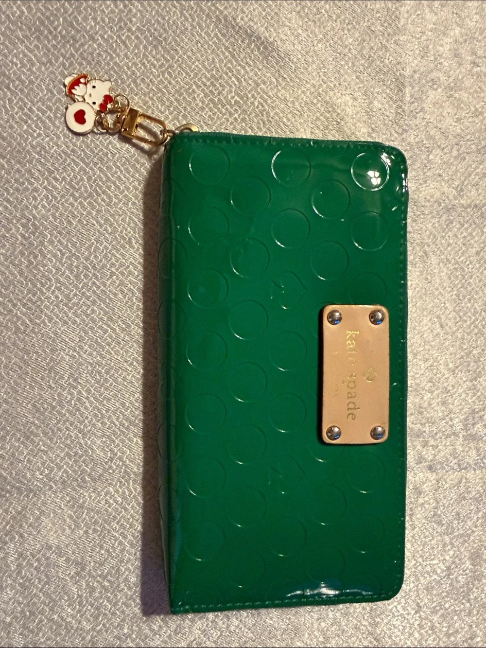 kate spade Green Patent Dot Zip Phone Wallet with Gold Plate